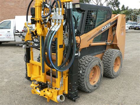 pneumatic rock drill for skid steer|skid steer well drilling attachment.